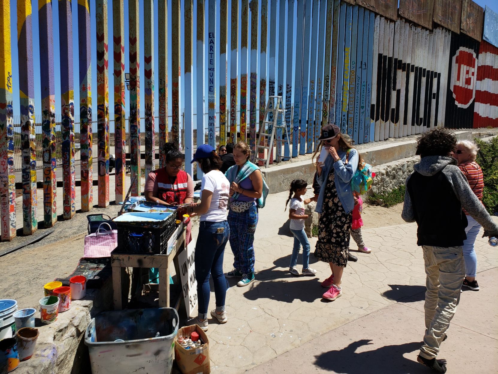 Painting the Brotherhood Mural (La Mural de la Hermandad)